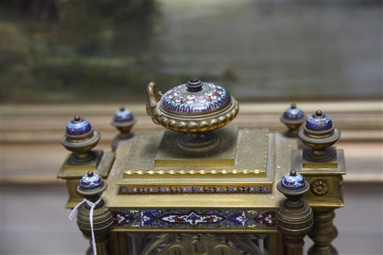 An early 20th century French ormolu and champleve enamel clock garniture, clock 14.5in.